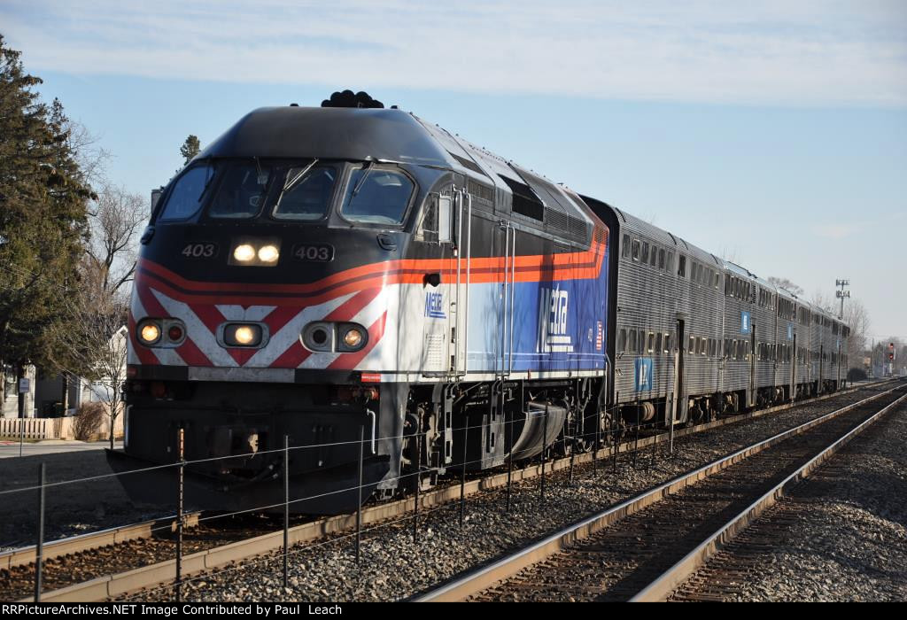 Westbound commuter train nears the station